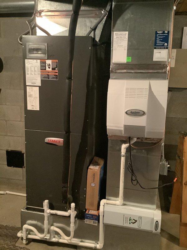 Completed MVP cooling maintenance on Lennox CBA39MV-048-230-6-02 unit with Aprilaire humidifier system. Performed standard preventative maintenance inspection, documented equipment specifications and serial number 1623D09081, verified proper operation of all system components including furnace, humidifier, and condensate drainage system.