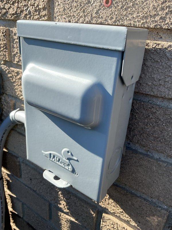 Completed comprehensive AC tune-up on residential cooling system. Performed standard preventive maintenance procedures including inspection of outdoor condensing unit, electrical disconnect box, and associated components. Unit exterior showed normal weathering consistent with outdoor installation, with all safety disconnects accessible and operational.