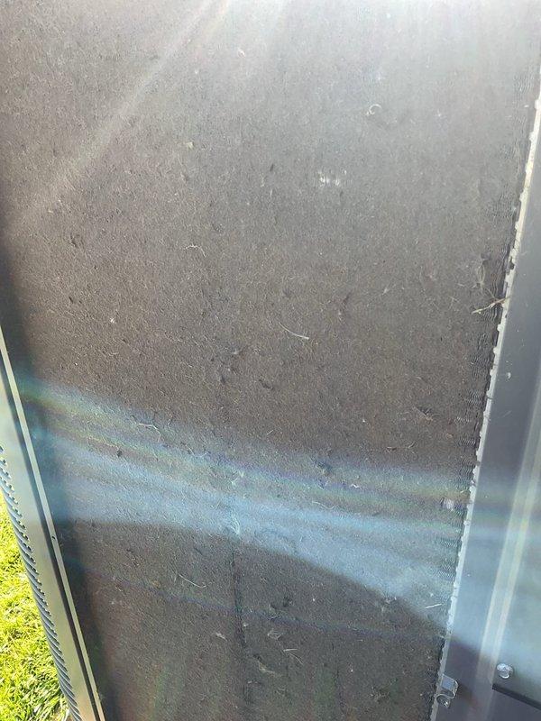 Completed comprehensive AC tune-up on residential cooling system. Performed standard preventive maintenance procedures including inspection of outdoor condensing unit, electrical disconnect box, and associated components. Unit exterior showed normal weathering consistent with outdoor installation, with all safety disconnects accessible and operational.