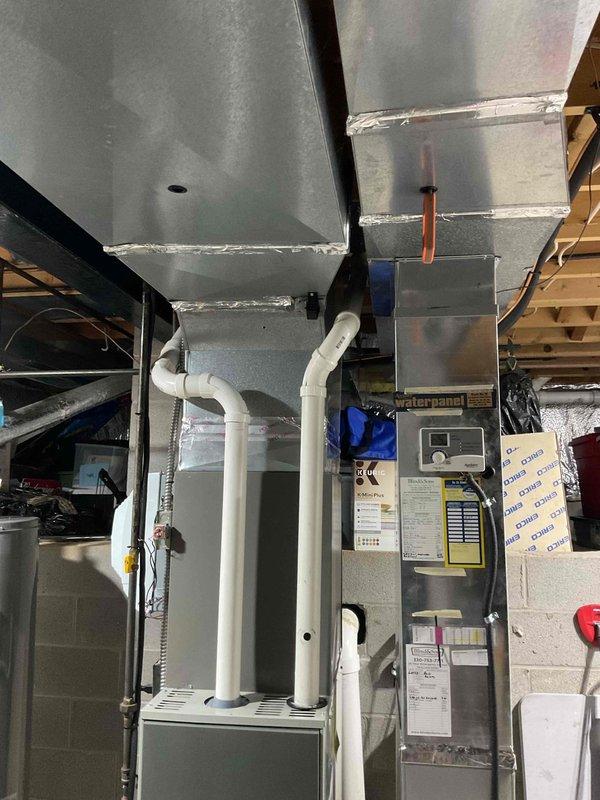 Completed scheduled AC tune-up on 3-year-old residential system. Performed comprehensive maintenance including inspection of Trane furnace and air handler, verified proper operation of all components, checked refrigerant lines and connections, inspected ductwork and PVC condensate drainage system, and confirmed all safety controls and labels were intact. System operating within normal parameters with no issues identified.