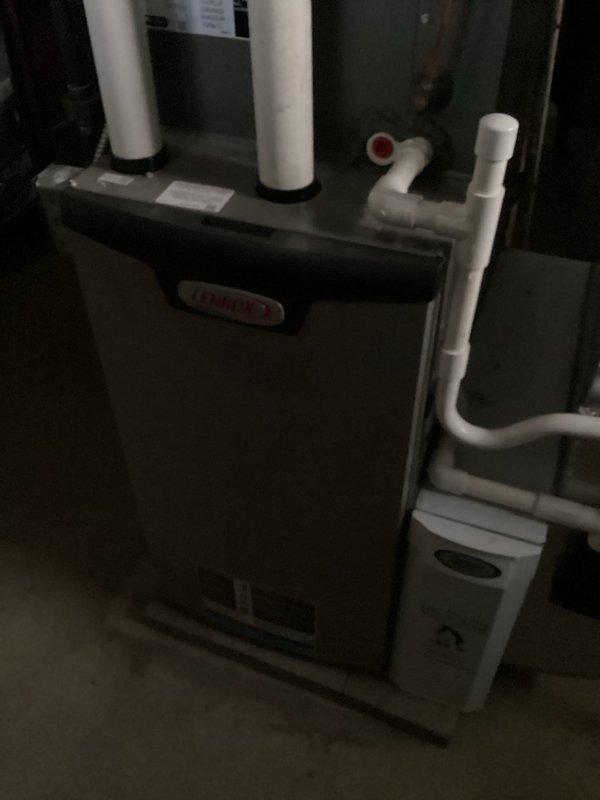 Completed comprehensive MVP air conditioning maintenance service at scheduled 8am appointment. Performed thorough inspection of HVAC system including condenser unit with heat exchanger coils, refrigerant lines, and furnace assembly. Examined condenser coil fins for debris accumulation and proper airflow, inspected refrigerant line connections and cylinder components for integrity, and verified all PVC condensate drainage and ventilation piping. System components showed normal wear patterns with minor surface debris noted on refrigerant lines. All equipment operational and functioning within manufacturer specifications upon completion of maintenance protocol.