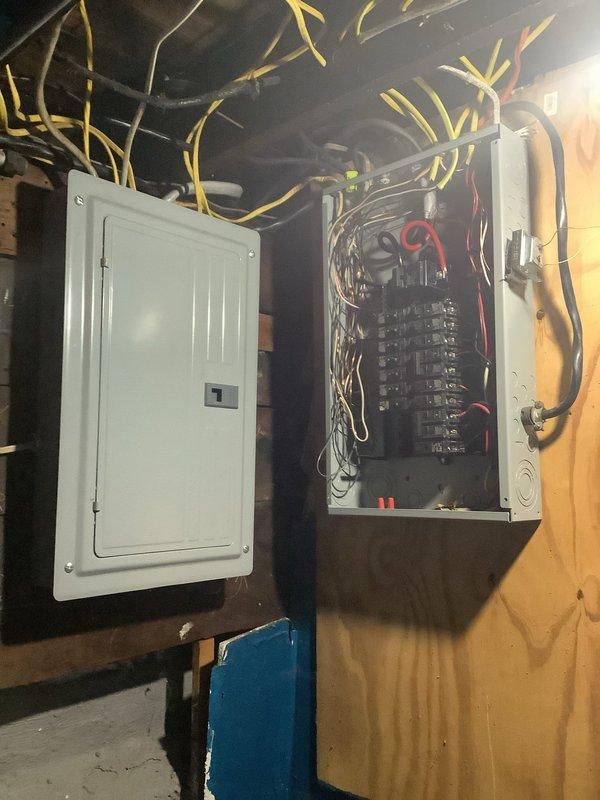 Responded to power outage affecting half of residence following storm event. Upon inspection of main electrical panel in basement, identified tripped main breaker caused by storm-related power surge. Reset main breaker and verified proper operation of all branch circuits. Tested electrical distribution throughout affected areas and confirmed full power restoration to all outlets and fixtures. All circuit breakers functioning normally with no signs of damage to panel components or wiring.