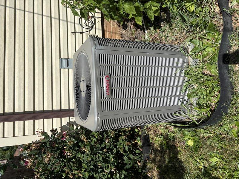 Completed MVP cooling maintenance visit on residential HVAC system. Performed comprehensive inspection of indoor furnace/air handler unit located in basement utility room and outdoor condenser unit. Verified proper operation of all system components including refrigerant lines, drainage systems, electrical connections, and airflow. Documented equipment condition through photographs showing both indoor and outdoor units in good working order with appropriate clearances maintained around outdoor condenser despite surrounding vegetation.
