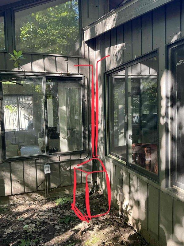 Conducted mini split system estimate for residential installation. Assessed interior mounting location in sunroom area with extensive glazing and exterior wall placement for condenser unit. Documented existing exterior line set installation on building with gray-green siding. Customer requested estimate review before proceeding with previously quoted installation work.