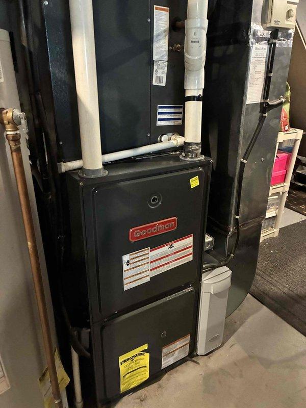 Completed preventive maintenance inspection on residential Goodman HVAC system for MVP customer. Performed visual inspection of indoor furnace unit and outdoor condensing unit, documented system condition with photos, and conducted electrical diagnostics on outdoor unit connections. All components found operating within normal parameters with no immediate service needs identified.