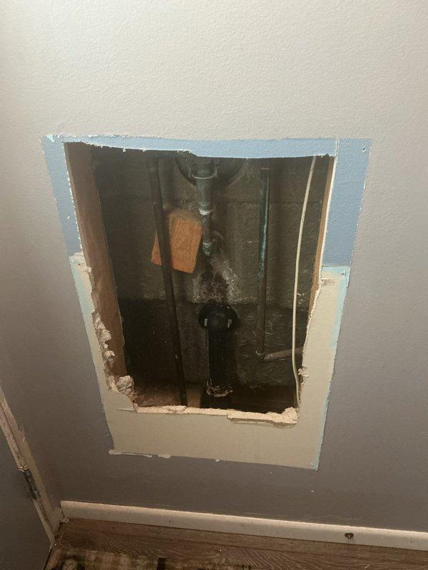 Responded to service call for leaking kitchen sink and customer-supplied faucet installation. Upon arrival, performed diagnostic assessment which revealed active water leak requiring access through ceiling to locate source and assess piping infrastructure. Cut access opening in ceiling to expose plumbing lines and identified leak point at pipe connection. Repaired leak by securing compromised fitting and verified water supply lines were properly sealed. Proceeded with removal of existing kitchen faucet and installed customer-supplied replacement unit, ensuring proper connections to hot and cold water supply lines with appropriate sealing and torque specifications. Tested all connections for leaks under pressure and confirmed proper operation of new faucet including handle function and water flow. Inspected basement area and water heater connections as part of comprehensive plumbing system assessment to ensure no additional leak sources were present. All work completed successfully with