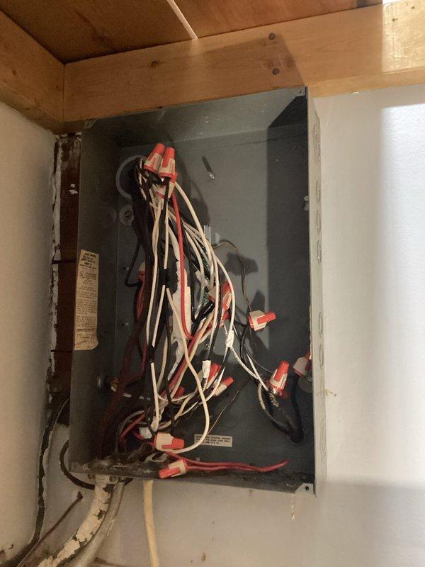 Completed a 200 amp service upgrade including installation of new weatherhead, point of attachment, service wire, and meter main with breaker space. Relocated the electrical panel from interior closet to exterior wall, installed main service grounding system with two ground rods (8 feet deep, 6 feet apart), ran copper grounding conductor to water meter, and installed bonding jumpers between hot, cold, and gas lines. Labeled all circuits in the new panel, pulled permit, and coordinated municipal inspection for code compliance.