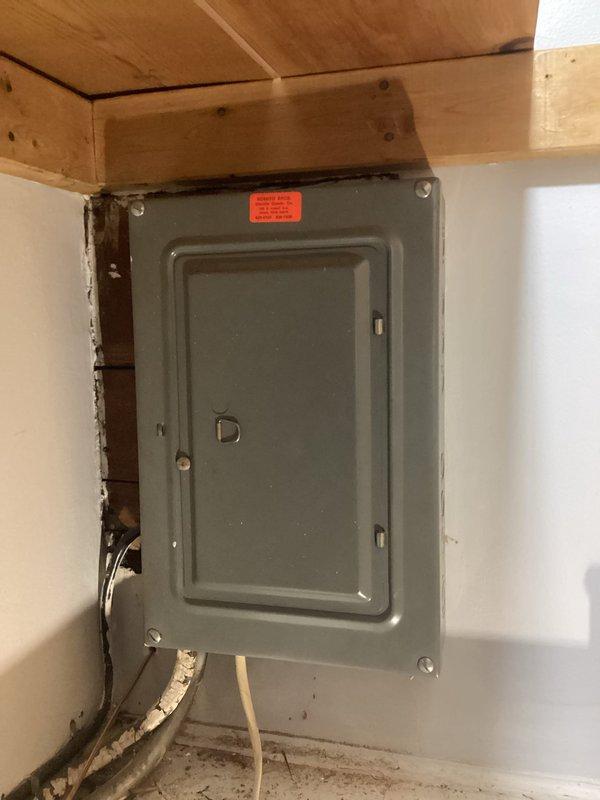 Completed a 200 amp service upgrade including installation of new weatherhead, point of attachment, service wire, and meter main with breaker space. Relocated the electrical panel from interior closet to exterior wall, installed main service grounding system with two ground rods (8 feet deep, 6 feet apart), ran copper grounding conductor to water meter, and installed bonding jumpers between hot, cold, and gas lines. Labeled all circuits in the new panel, pulled permit, and coordinated municipal inspection for code compliance.