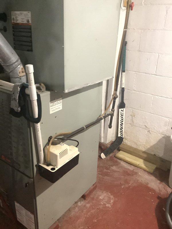 Conducted on-site assessment for complete HVAC system replacement including furnace and air conditioning equipment. Evaluated existing outdoor condensing unit on concrete pad and basement furnace installation, documented current equipment specifications, reviewed refrigerant line routing and electrical connections, and prepared comprehensive replacement estimate for new heating and cooling system.