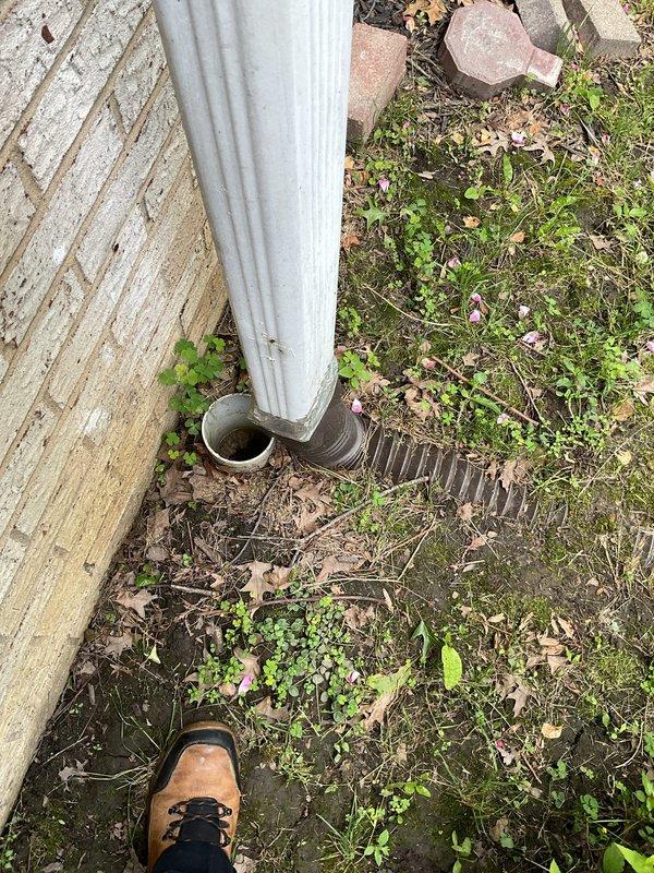 Responded to a clogged outdoor plumbing main line at a 52-year-old residential property requiring multiple service visits to fully resolve the drainage issue. Inspected and cleared the exterior drainage system, including downspout connections and underground piping at the building foundation. Successfully restored proper water flow through the main line after identifying and removing blockage in the corrugated drainage pipe system.