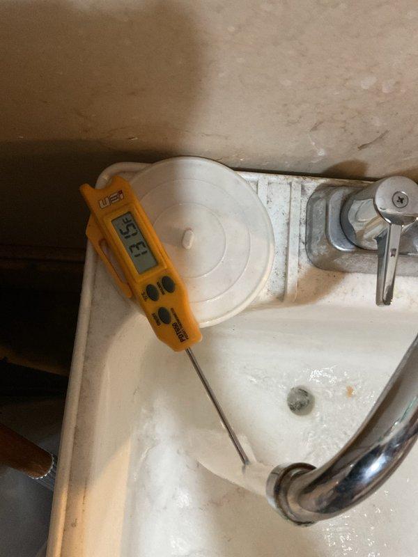 Responded to service call for natural gas water heater approximately four years old not producing adequately warm water. Upon arrival, performed diagnostic testing and temperature measurements to assess system performance. Inspected water heater components and verified proper operation of heating elements and thermostat controls to identify cause of insufficient water temperature.