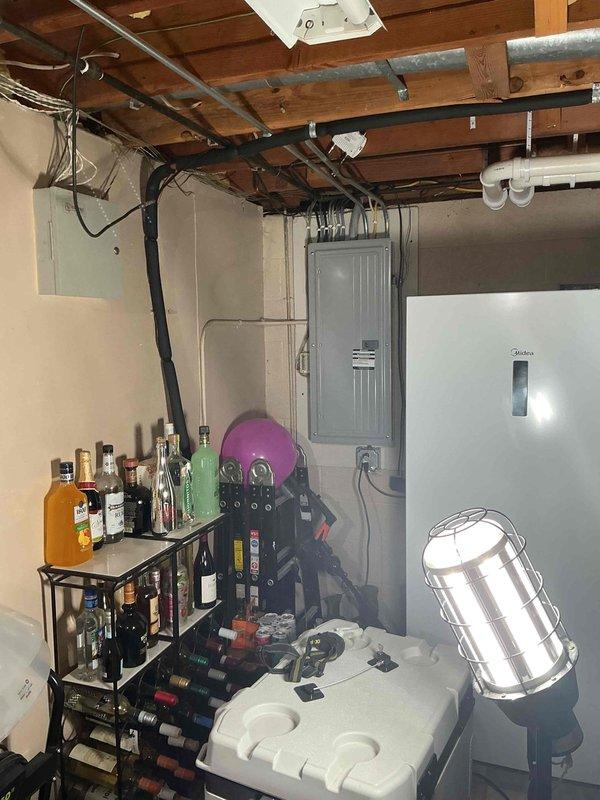 Conducted site assessment for pool installation electrical requirements, specifically evaluating grounding circuit needs around pool perimeter. Inspected existing electrical panel in basement utility area and documented current electrical infrastructure to prepare comprehensive estimate for proper bonding and grounding installation per NEC pool safety standards.