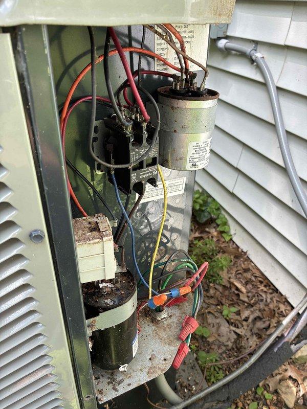 Completed comprehensive cooling maintenance on American Standard outdoor condensing unit. Performed visual inspection of electrical components including dual capacitors, wiring connections, and control systems. Verified proper wire terminations with color-coded conductors and secure wire nut connections. Inspected unit housing, louvered ventilation panels, and fan guard assembly for structural integrity. Noted normal outdoor weathering and minor debris accumulation on base plate. All electrical components found intact and functional. Furnace maintenance was not performed per current service parameters.