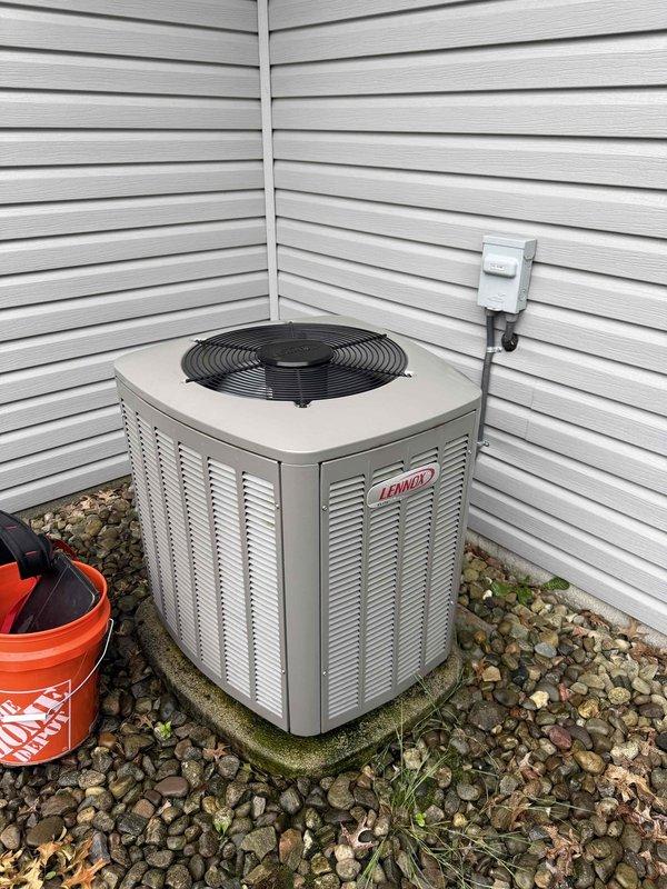 Completed MVP cooling maintenance visit on residential Lennox outdoor condensing unit. Performed standard system inspection, verified unit operation, and documented equipment condition with photos. Unit found operating properly with adequate airflow through louvered panels and fan assembly functioning normally.

During inspection, observed water heater in separate area showing significant floor staining and water damage around base, indicating possible leak or moisture issues requiring attention. Documented condition for customer awareness and potential follow-up service.