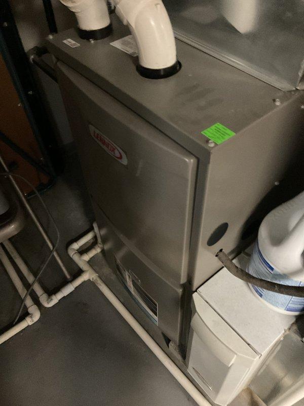 Completed MVP cooling maintenance visit on residential HVAC system. Performed comprehensive inspection of furnace/air handler unit and associated components in mechanical room, including examination of PVC condensate drainage system, flexible ductwork connections, and electrical systems. Verified proper operation of all safety controls and manufacturer specifications on equipment dating to 2014. Inspected attic-mounted HVAC components, including cylindrical air handler section with proper labeling and warning placards intact. Confirmed condensate drain lines are clear and properly routed. All systems operational and functioning within normal parameters.