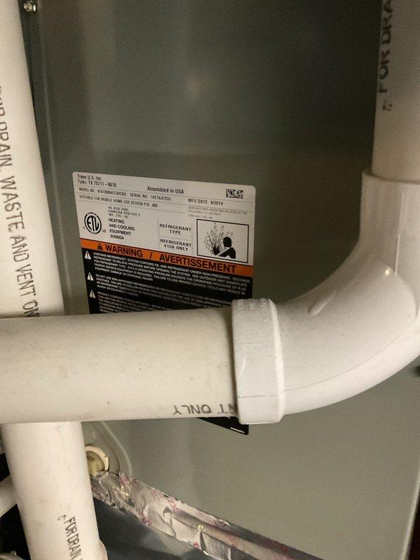 Completed MVP cooling maintenance visit on residential HVAC system. Performed comprehensive inspection of furnace/air handler unit and associated components in mechanical room, including examination of PVC condensate drainage system, flexible ductwork connections, and electrical systems. Verified proper operation of all safety controls and manufacturer specifications on equipment dating to 2014. Inspected attic-mounted HVAC components, including cylindrical air handler section with proper labeling and warning placards intact. Confirmed condensate drain lines are clear and properly routed. All systems operational and functioning within normal parameters.