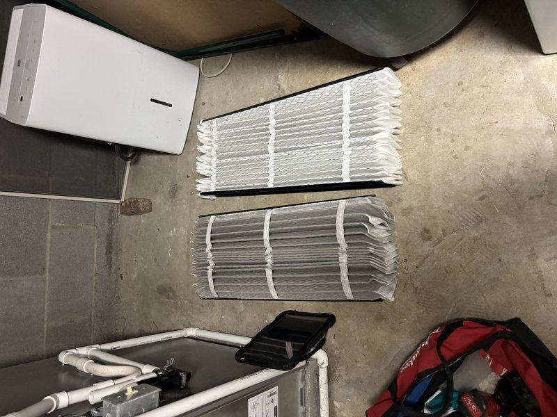 Completed MVP recurring cooling maintenance visit on 3-year-old HVAC system. Performed comprehensive inspection of indoor air handler unit, replaced dirty pleated air filter with new filter, and inspected condensate drain line assembly. Evaluated outdoor condenser unit, noting significant dirt accumulation on top grille and coil requiring cleaning attention. Confirmed system operational status and documented equipment condition with photographic records for maintenance history tracking.
