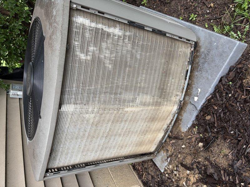 Completed MVP recurring cooling maintenance visit on 3-year-old HVAC system. Performed comprehensive inspection of indoor air handler unit, replaced dirty pleated air filter with new filter, and inspected condensate drain line assembly. Evaluated outdoor condenser unit, noting significant dirt accumulation on top grille and coil requiring cleaning attention. Confirmed system operational status and documented equipment condition with photographic records for maintenance history tracking.