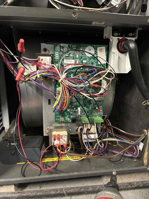 Completed comprehensive air conditioning tune-up on residential condensing unit, including inspection of exterior components, electrical connections, and control board functionality. Verified proper operation of capacitors, relay systems, and circuit board, with all wiring connections secure and system operating within normal parameters.