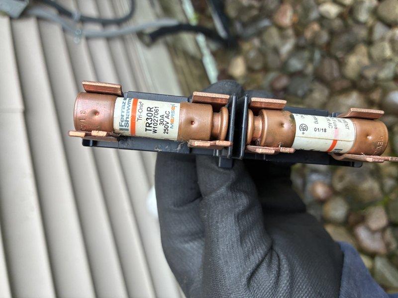 Completed MVP air conditioning maintenance service. Upon arrival, diagnosed and replaced failed TR30R time-delay fuses in the outdoor unit's electrical disconnect. Verified proper voltage and amperage readings using digital multimeter to ensure system electrical components were functioning within manufacturer specifications. Unit tested and confirmed operational.
