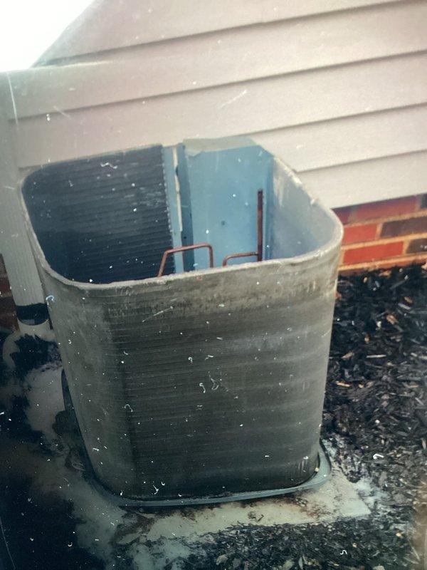 Performed comprehensive system evaluation on ten-year-old cooling system currently operating normally. Identified outdoor unit capacitor testing below acceptable tolerance levels, requiring replacement to prevent system failure and loss of cooling capacity. Recommended chemical cleaning of evaporator coil, condenser coil, and blower wheel to remove debris and bacterial growth, improve indoor air quality, and restore system efficiency per manufacturer maintenance guidelines. Advised installation of drain tablets in evaporator pan to sanitize system and prevent PVC drain line clogs caused by bacteria and calcium buildup. Recommended surge protection device installation on circuit board to protect against electrical damage from power surges and outages. Suggested compressor hard start kit installation to reduce compressor wear and improve electrical efficiency. Documented system conditions with photographs of outdoor unit components and electrical control panel wiring. All required replac