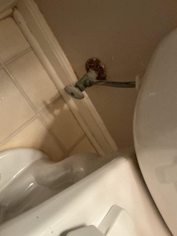 Responded to service call for two toilet issues in residence. Downstairs toilet exhibited continuous running condition due to faulty flapper valve assembly. Inspected tank components and found deteriorated flapper causing water to leak from tank into bowl, preventing fill valve from shutting off properly. Replaced flapper valve and adjusted chain length for proper seal. Tested flush cycle to confirm proper operation and water shut-off.

Upstairs toilet required wax ring replacement due to compromised seal at floor flange connection. Removed toilet from mounting bolts, scraped old wax ring residue from flange and toilet base, and installed new wax ring. Reset toilet onto flange, secured with mounting hardware, and reconnected water supply line. Verified seal integrity and tested for leaks. Both toilets restored to proper working condition.