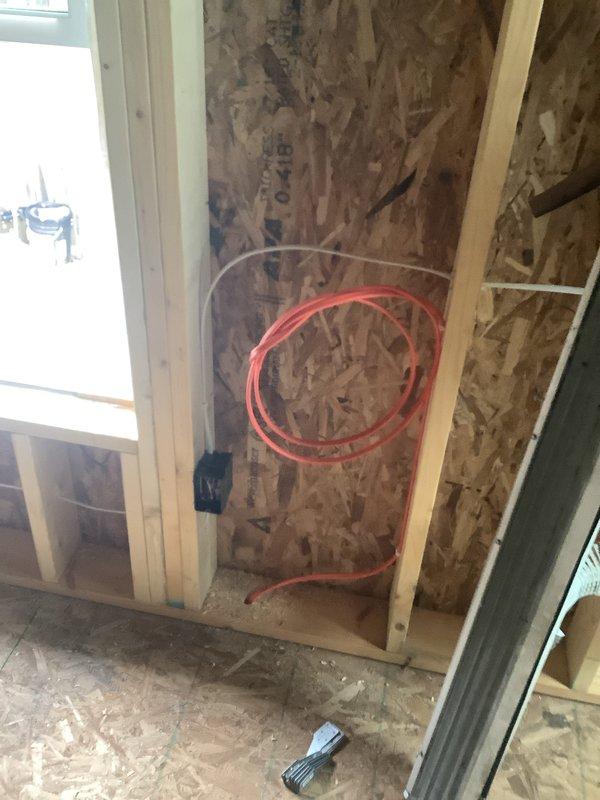 Conducted site assessment for mini split installation in new addition space currently under construction. Evaluated framing structure, existing electrical rough-in, and ventilation requirements to determine optimal equipment placement and line set routing for climate control system serving the workspace area.