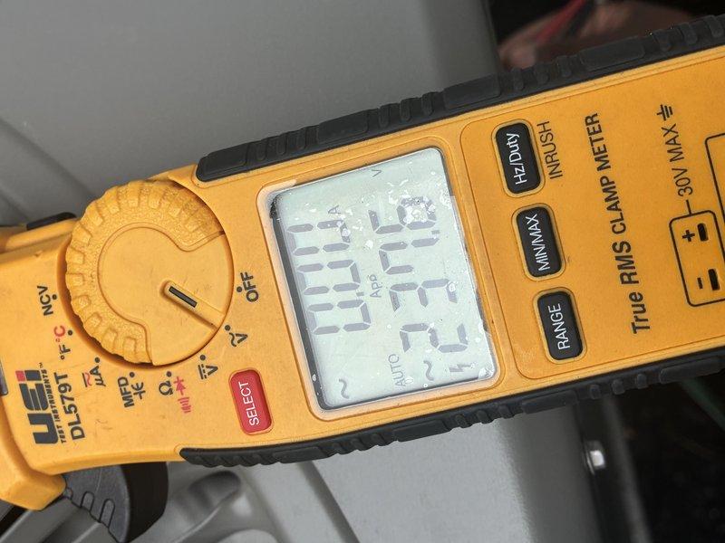 Completed MVP cooling maintenance service on HVAC system. Performed electrical diagnostics using digital clamp meter, recording amperage and voltage readings to verify proper system operation. Inspected capacitor connections and confirmed all wire terminations were secure, with proper color-coded wiring intact on all terminals.