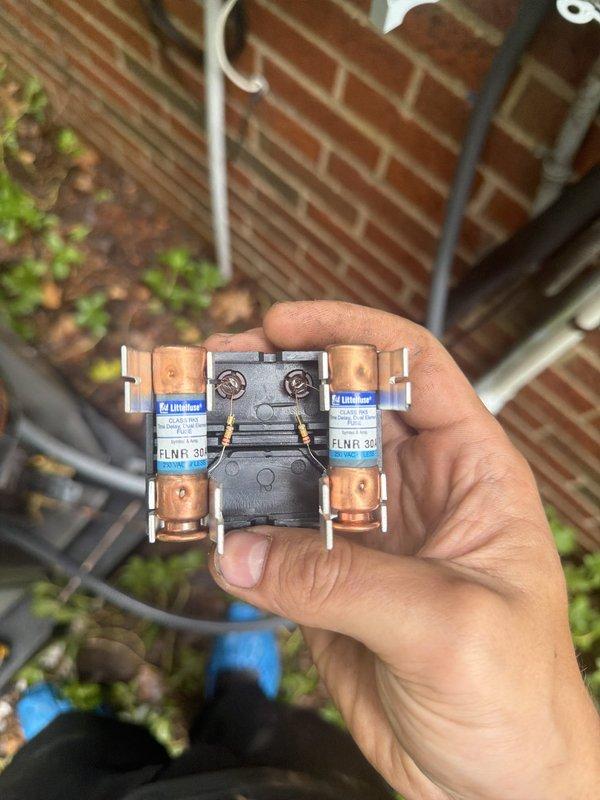 Completed full HVAC system installation including outdoor Lennox condensing unit and attic-mounted air handler. Installed new drain pan for air handler as required, mounted outdoor unit on composite pad against exterior brick wall, and ran electrical conduit and refrigerant lines between components. Installed FLNR 30 amp fuses in disconnect box, verified all electrical connections, and tested system operation to ensure proper cooling performance.