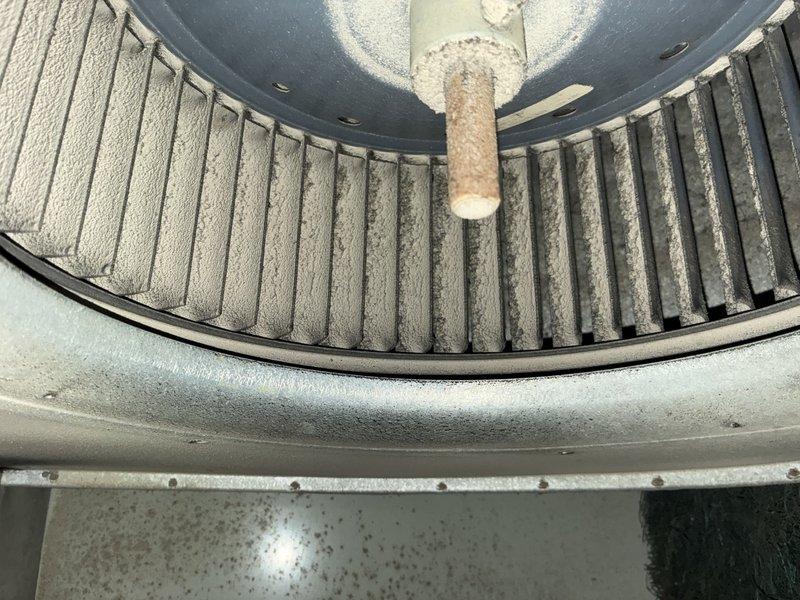 Completed MVP cooling maintenance visit on 20-year-old HVAC system. Upon inspection, found extensive dust and debris accumulation throughout air handler interior, including heavy buildup on evaporator coil assembly showing signs of corrosion and deterioration. Blower wheel exhibited significant dirt accumulation on blades and housing, with visible rust on central motor mounting hub. Cleaned and serviced unit components, removing debris from base pan and serpentine refrigerant lines. Documented pre-service condition showing need for continued maintenance on aging equipment.