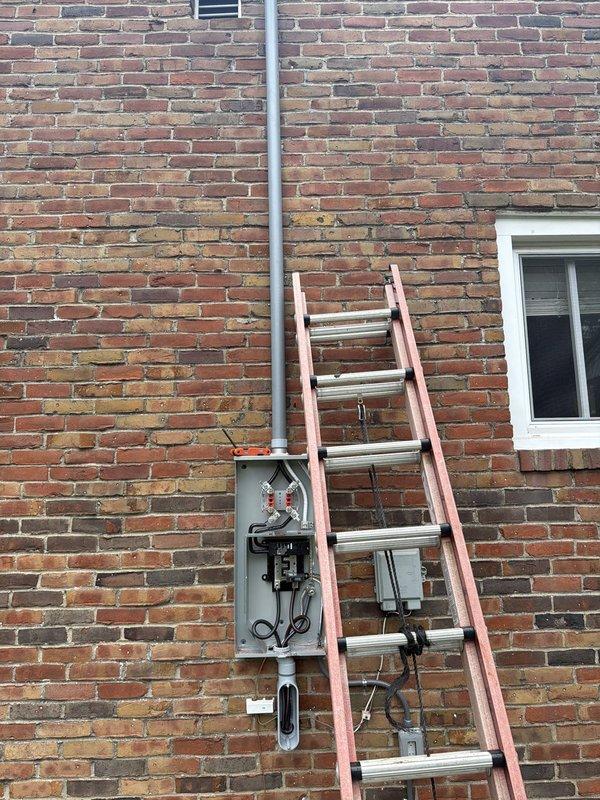 Installed new 200 amp exterior service with disconnect, running service in conduit from exterior meter to main panel. Refed existing panel with SER cable, properly separating grounds and neutrals throughout. Installed new ground rod system, waterline ground, and bonded hot water tank and water softener per code requirements. Replaced AC disconnect and installed whole home surge protection device. Upgraded main electrical panel to 200 amp capacity with proper circuit labeling and documentation for inspection approval.