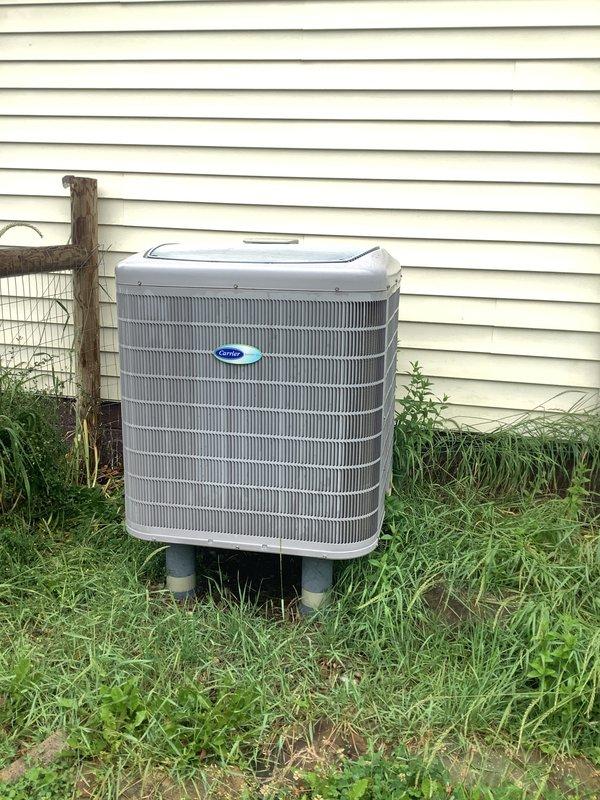 Conducted comprehensive on-site evaluation for complete HVAC system replacement. Assessed existing Carrier outdoor condensing unit and indoor air handling equipment currently serving the residence. Documented current system configuration including outdoor condenser positioned on concrete pad with proper clearances and indoor equipment mounted in basement utility area. Evaluated electrical connections, refrigerant line sets, condensate drainage, and overall system accessibility for replacement work. Photographed existing equipment placement, mounting locations, and surrounding infrastructure to facilitate accurate replacement planning and equipment sizing recommendations.