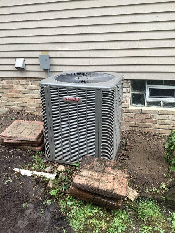 Completed MVP Cooling Visit maintenance on Lennox outdoor condensing unit and associated indoor HVAC system. Performed comprehensive system inspection including visual assessment of outdoor unit condition, clearance verification, and indoor equipment evaluation. Documented equipment operation and overall system condition through photographic records showing proper installation and functionality of furnace, Aprilaire humidifier, ductwork connections, and condensate drainage system.