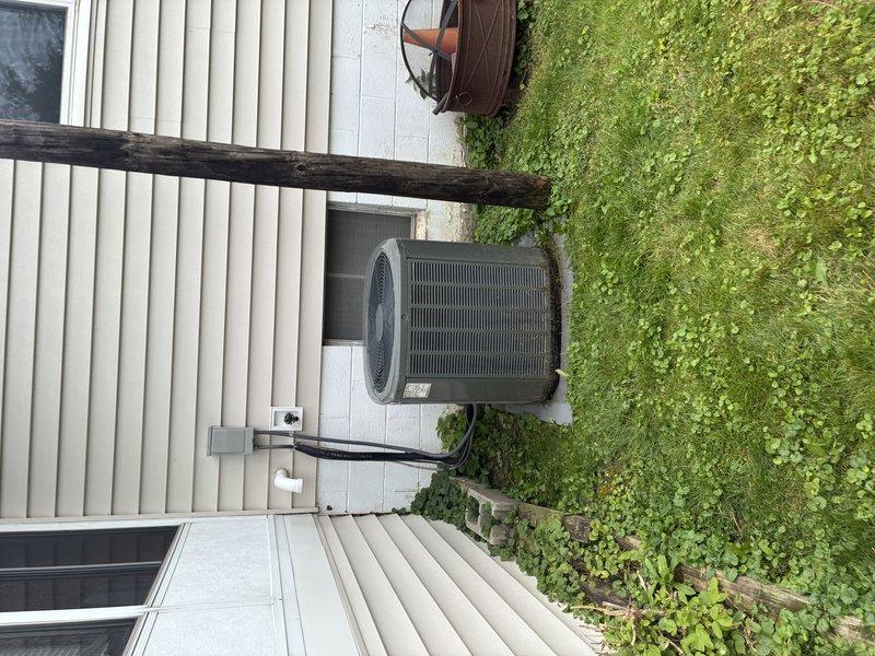 Completed scheduled MVP cooling maintenance visit on 12-year-old Trane XR13 air conditioning system. Performed comprehensive system inspection, documented unit condition with photos showing exterior housing and installation configuration, and verified proper refrigerant line routing and electrical disconnect accessibility. Unit rescheduled per customer request to accommodate their preferred service timeline.