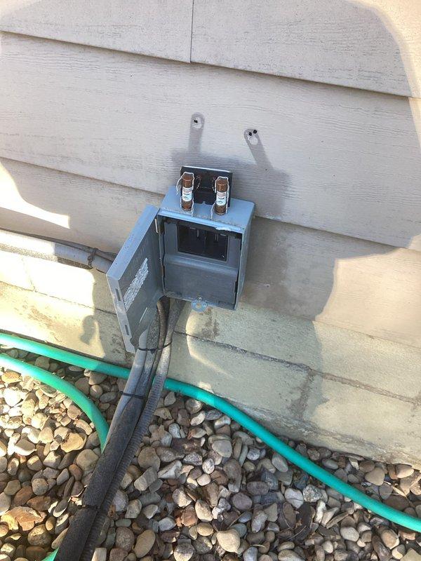 Completed MVP cooling maintenance visit on 3-year-old system. Inspected electrical disconnect box with cartridge fuses, verified proper operation and secure mounting. Evaluated outdoor condensing unit and observed heavily soiled condenser coil with significant dirt and debris accumulation restricting airflow through fins. Checked refrigerant line connections and electrical wiring routing. System operational but coil condition noted for reduced efficiency. Standard preventive maintenance performed per recurring service agreement.