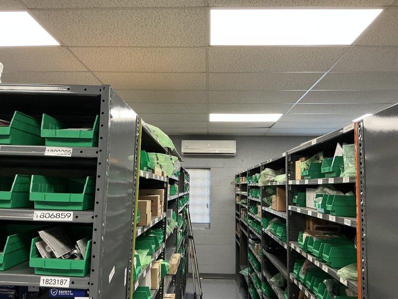 Conducted on-site evaluation for mini split air conditioning system installation in commercial parts storage facility. Assessed warehouse environment with high-density industrial shelving, inventory storage areas, and existing HVAC infrastructure to determine optimal equipment placement and capacity requirements for climate control needs.