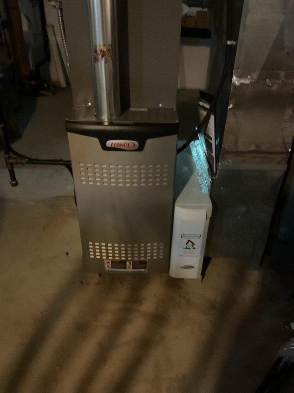 Completed annual cooling system tune-up on Lennox furnace unit with no reported issues. Performed comprehensive inspection of electrical connections, terminal blocks, and wiring harnesses, verifying all connections were secure and properly terminated. Inspected humidifier accessory unit and associated components for proper operation. All system components found to be in functional condition with no immediate service needs identified.