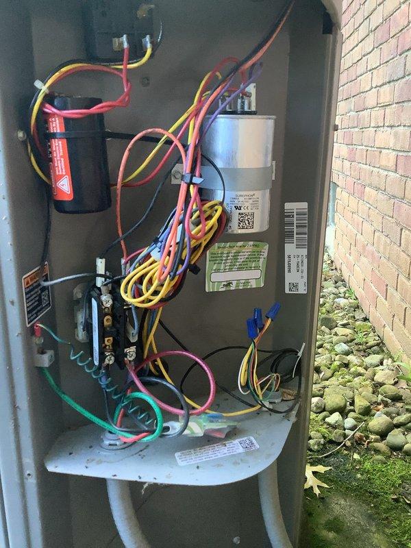 Completed MVP recurring cooling maintenance visit on residential HVAC system. Performed comprehensive inspection of outdoor condensing unit electrical components including capacitor, contactor, and wiring connections, as well as indoor furnace and air handler equipment. All system components found to be operating within normal parameters with proper electrical connections and refrigerant lines secure.