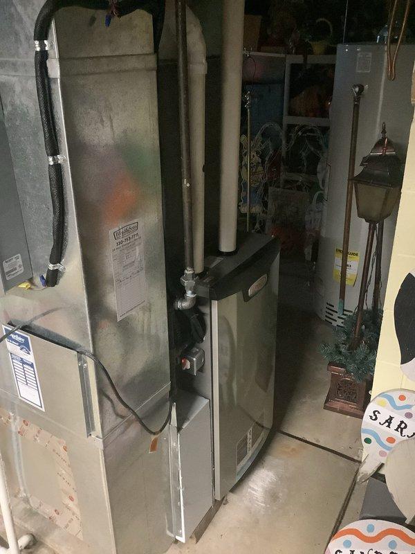 Completed MVP recurring cooling maintenance visit on residential HVAC system. Performed comprehensive inspection of outdoor condensing unit electrical components including capacitor, contactor, and wiring connections, as well as indoor furnace and air handler equipment. All system components found to be operating within normal parameters with proper electrical connections and refrigerant lines secure.
