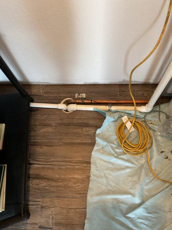 Performed routine maintenance flush on an 8-year-old Rheem tankless water heater unit located in an upstairs closet. Successfully completed descaling procedure by circulating cleaning solution through the heat exchanger to remove mineral buildup and sediment accumulation, flushed the system thoroughly, and verified proper operation with temperature output reading at 125°F upon completion.