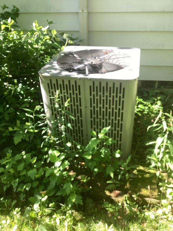 Completed routine preventive maintenance cooling visit on 26-year-old residential air conditioning system under MVP agreement. Performed standard inspection and servicing of outdoor condenser unit and indoor air handling components. Noted significant vegetation overgrowth around condenser unit restricting airflow and reducing system efficiency; documented condition for customer awareness. Inspected dual air filters in return air housing, which showed moderate dust accumulation consistent with normal operation. All essential maintenance tasks completed per manufacturer specifications and service protocol.
