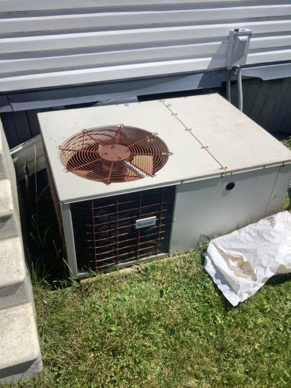 Responded to service call for air conditioning system not cooling with non-operational fan. Upon inspection of outdoor condenser unit and indoor blower assembly, diagnosed failed condenser fan motor preventing proper heat exchange and system cooling. Replaced defective fan motor, verified proper rotation and airflow, tested system operation under load, and confirmed restoration of cooling capacity with all components functioning within normal parameters.