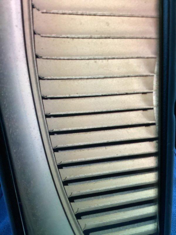 Completed MVP recurring cooling maintenance visit on 22-year-old system. Performed standard inspection of indoor and outdoor components. Examined return air grille showing minor dust accumulation on slats but overall functional condition. Inspected outdoor condenser unit including fan assembly with four-blade configuration and condenser coil fins. All components operational despite age-related weathering typical for exterior equipment. System continues to function within acceptable parameters for unit of this vintage.