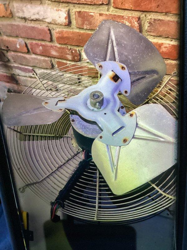 Completed MVP recurring cooling maintenance visit on 22-year-old system. Performed standard inspection of indoor and outdoor components. Examined return air grille showing minor dust accumulation on slats but overall functional condition. Inspected outdoor condenser unit including fan assembly with four-blade configuration and condenser coil fins. All components operational despite age-related weathering typical for exterior equipment. System continues to function within acceptable parameters for unit of this vintage.