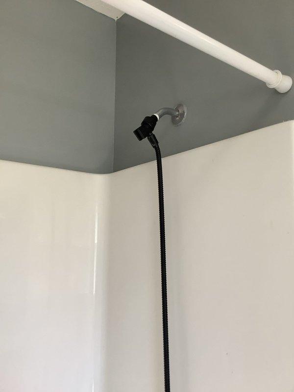Responded to service call for leaky tub/shower in 20-year-old residential property. Upon inspection, identified corroded drain kit as source of leak requiring complete replacement. Removed existing deteriorated drain assembly and installed new drain kit with updated components to restore proper function and eliminate water leakage. Tested installation to verify watertight seal and proper drainage operation.