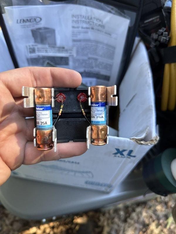 Completed installation of new Lennox air conditioning system with evaporator coil to existing furnace infrastructure. Installed 25-ampere fuses in disconnect box, connected refrigerant lines with proper insulation, and verified all electrical connections to manufacturer specifications. System tested and operational with proper airflow through newly installed A-coil mounted to furnace plenum.