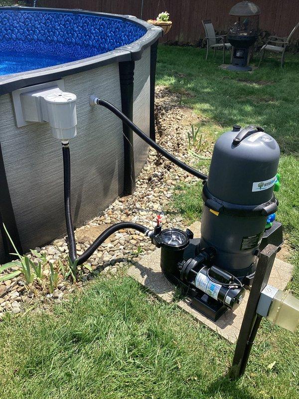 Installed grounding system for above-ground pool and associated filtration equipment to meet electrical safety code requirements. Bonded pool pump, filter assembly, and metal components using appropriate copper conductors and grounding clamps, ensuring proper electrical continuity throughout the pool system to prevent potential shock hazards.