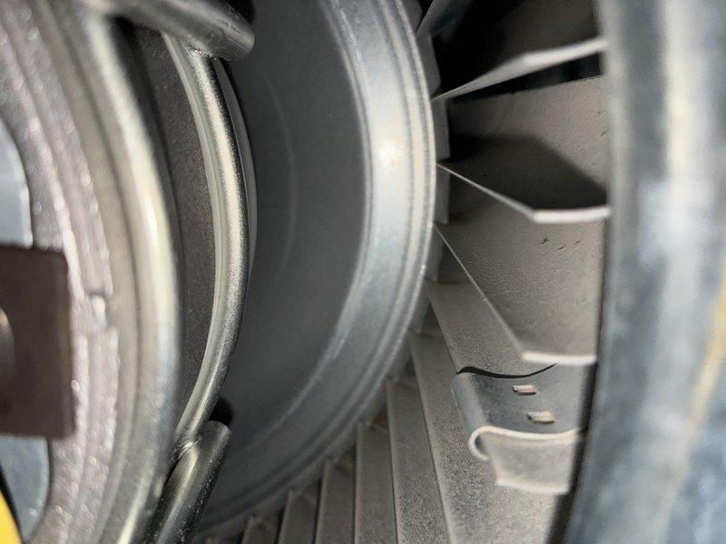 Performed routine AC cooling maintenance visit. Inspected and replaced dirty air filter showing significant dust accumulation. Examined blower assembly and fan components, confirming proper operation and airflow through the system.