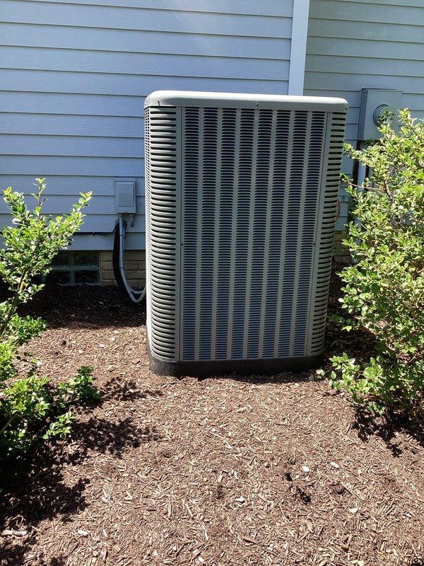 Completed MVP recurring cooling maintenance visit on residential split system. Performed comprehensive inspection of outdoor condenser unit, verified proper refrigerant line connections, and checked electrical disconnect. Inspected Aprilaire humidifier control system inside air handler, noting operational status and mineral deposits on evaporator panel indicating normal seasonal usage.