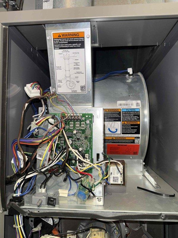 # HVAC Maintenance - Cooling

Completed comprehensive MVP cooling maintenance visit on residential HVAC system. Performed thorough inspection of air handler unit and control components. Accessed main equipment cabinet and documented condition of control board, wiring harnesses, and safety systems. Verified all electrical connections secure and properly terminated. Inspected electronic control module and safety labels for compliance. Examined evaporator coil assembly and refrigerant line connections within ductwork. Confirmed proper insulation placement and integrity of foil-backed duct insulation. Checked copper refrigerant tubing for proper routing and secure connections. All system components found operating within normal parameters. Unit running efficiently with no deficiencies noted. System ready for continued operation.